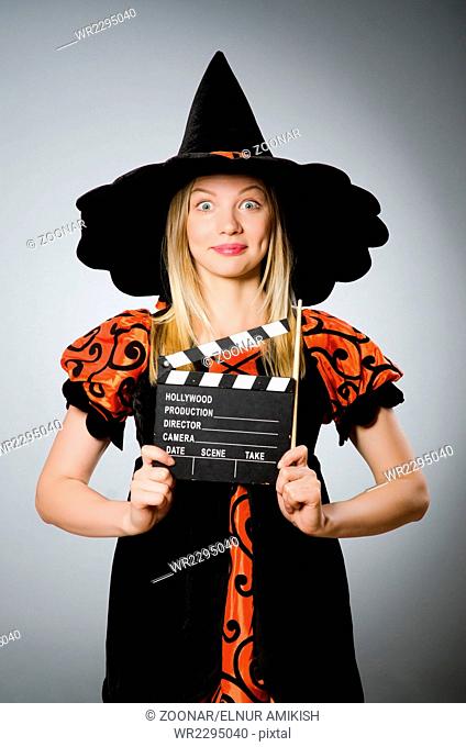 Witch with the movie clapboard