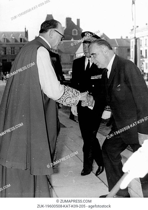 May 8, 1963 - Orleans, France - President of the French Republic GEORGES POMPIDOU shakes hands with Monsignor BRUN the archipriest of the Cathedral of Orleans