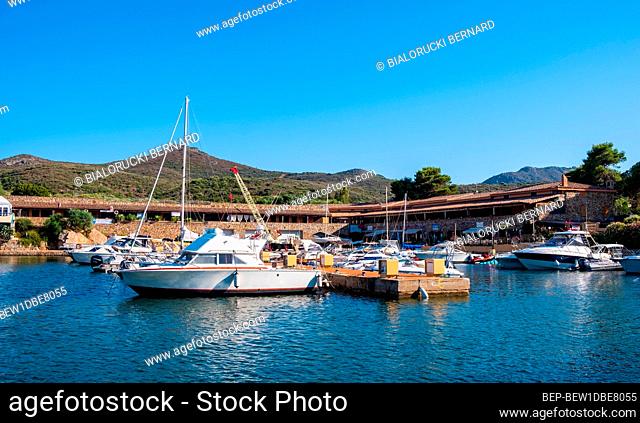 Marinella, Sardinia / Italy - 2019/07/16: Panoramic view of Golfo di Marinella port and marina quarter - Porto Marana - at the Costa Smeralda Emerald Coast of...