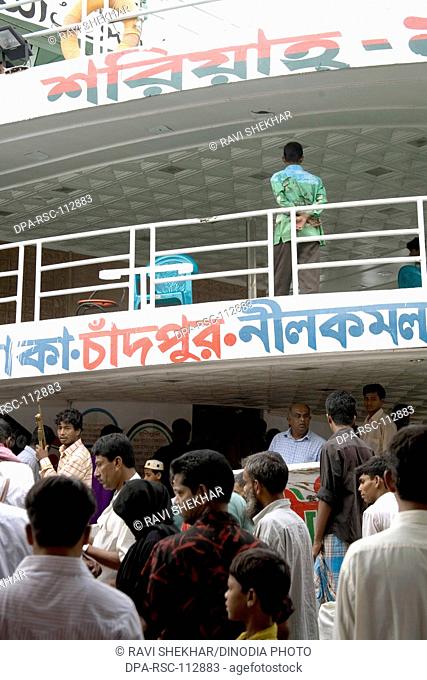 Bangla script Dhaka Chandpur cruise in Burigunga Buri Gunga River ; Sadarghat Boat terminal ; Dhaka ; Bangladesh