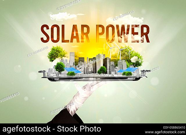 Waiter serving eco city with SOLAR POWER inscription, renewabke energy concept