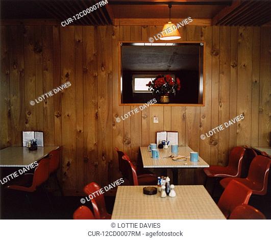 interior of old-fashioned cafe, tables and chairs