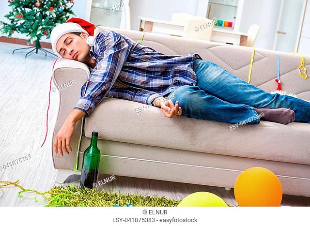 Man having hangover after christmas party