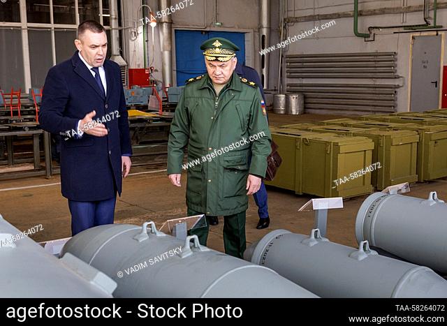 RUSSIA, NIZHNY NOVGOROD REGION - APRIL 6, 2023: Russia's Defence Minister Sergei Shoigu (R) checks regional enterprises to ensure the fulfilment of the state...