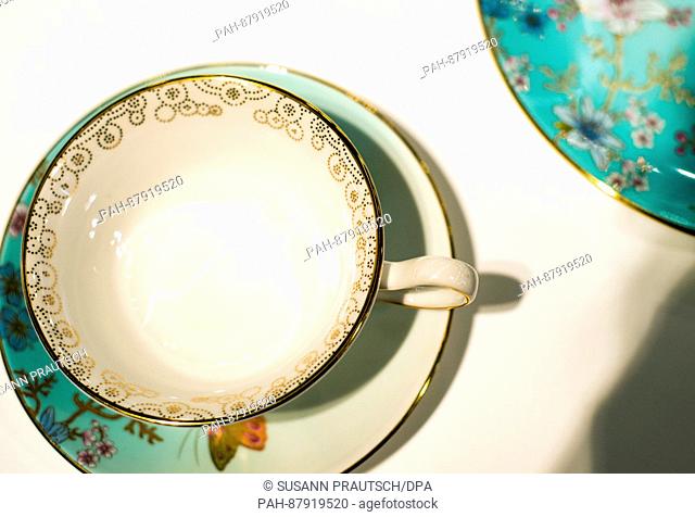 Cups, saucers, and plates are displayed on a table at the Wedgewood company stand at the preview of the Ambiente trade fair in Frankfurt am Main,  Germany