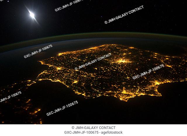 The city lights of Madrid (just right of center) stand out in this photograph from the International Space Station. Recorded by one of the Expedition 30 crew...