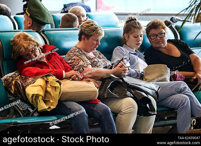 RUSSIA, MOSCOW REGION - SEPTEMBER 21, 2023: Travellers are seen in the waiting area at the Domodedovo International Airport. Sergei Karpukhin/TASS