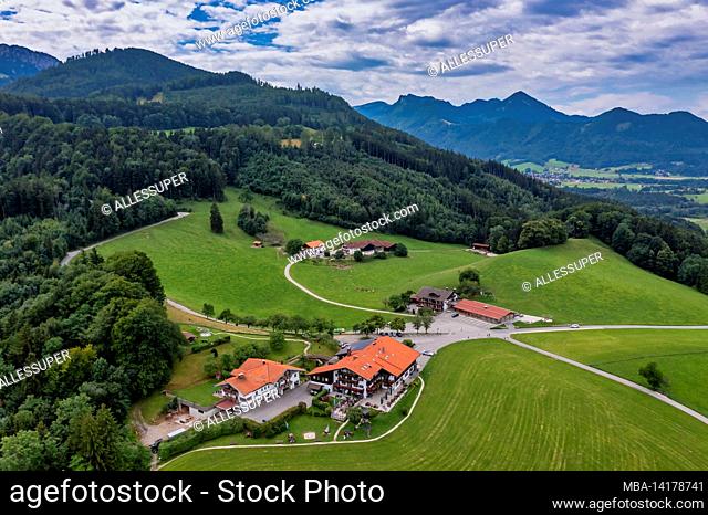 The Seiser Alm at the lake Chiemsee shot by a drone from above - the beautiful restaurant at the bavarian alps in southern germany