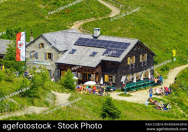 24 July 2021, Austria, Kals: The Kals-Matreier-Törl-Haus (hut) at 2, 207 metres. Photo: Patrick Pleul/dpa-Zentralbild/ZB. - Kals/Tyrol/Austria