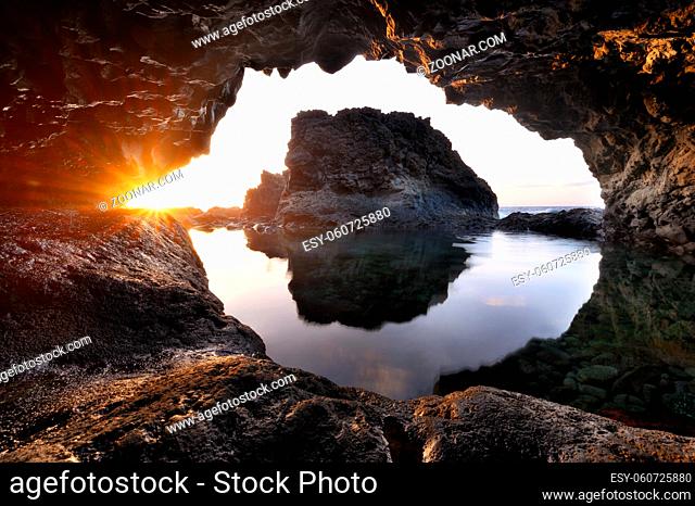 Amazing Sea Cave landscape at Sunset. Nature Photography background. High quality photo
