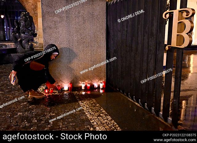 Lighting Candles outside the Faculty of Arts of Charles University after shooting incident which claimed fifteen lives in Prague, Czech Republic, December 21