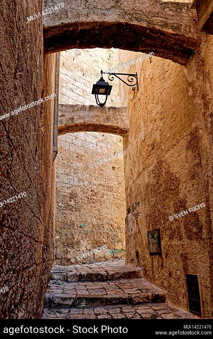 Archways and street lamp in the old town of Monopoli, Puglia, Italy