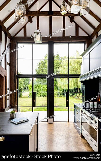 Kitchen in a converted barn/mill in Essex, UK, featuring beautful steel windows