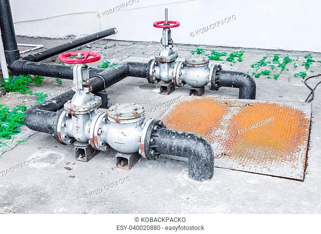 The flanges, couplings, valves and pipes of an irrigation water pumping facility