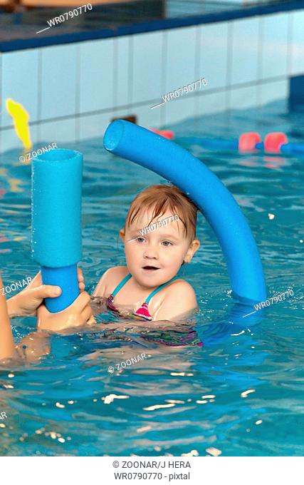 little child in swimming pool