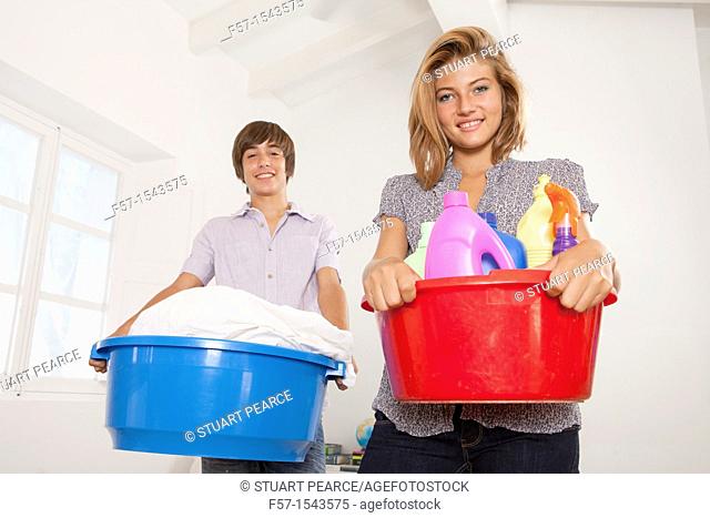 Teenagers doing housework