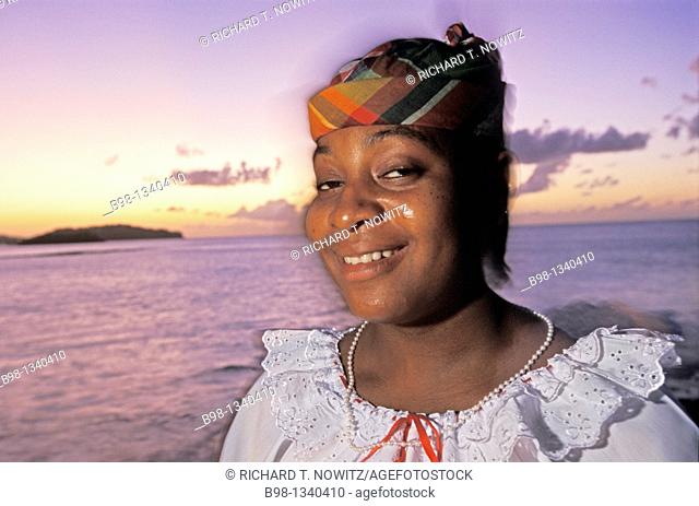 Local woman part of folk dance company at sunset Saint Lucia, West Indies