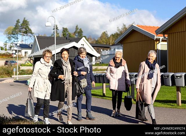 Group of senior women walking together