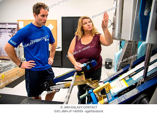European Space Agency astronaut Thomas Pesquet participates in an advanced Resistive Exercise Device (aRED) training session in the Columbia Center at NASA's...