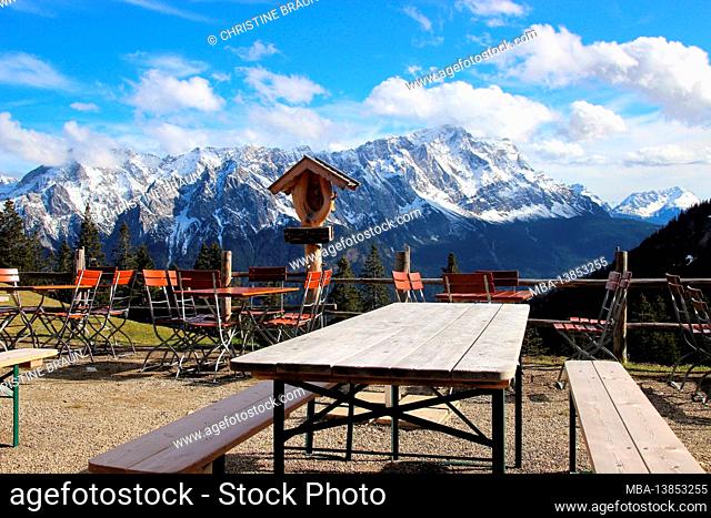 Stepbergalm in front of Zugspitze, near Garmisch, Wetterstein Mountains, Upper Bavaria, Bavaria, Germany, hospitality, inviting, seating