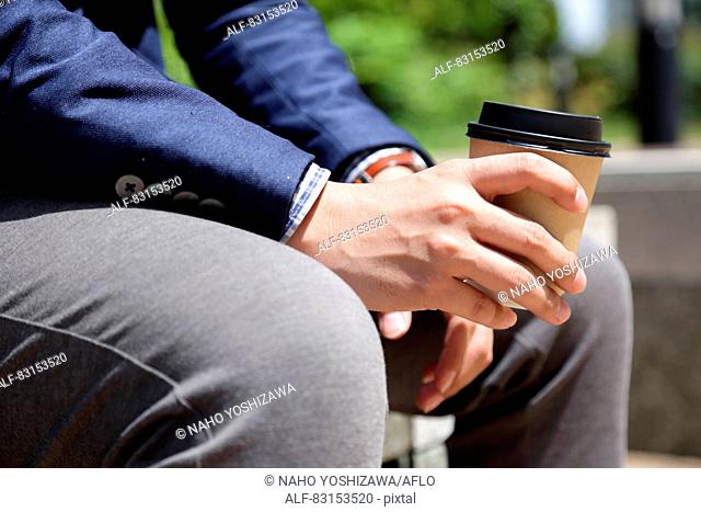 Japanese businessman with coffee