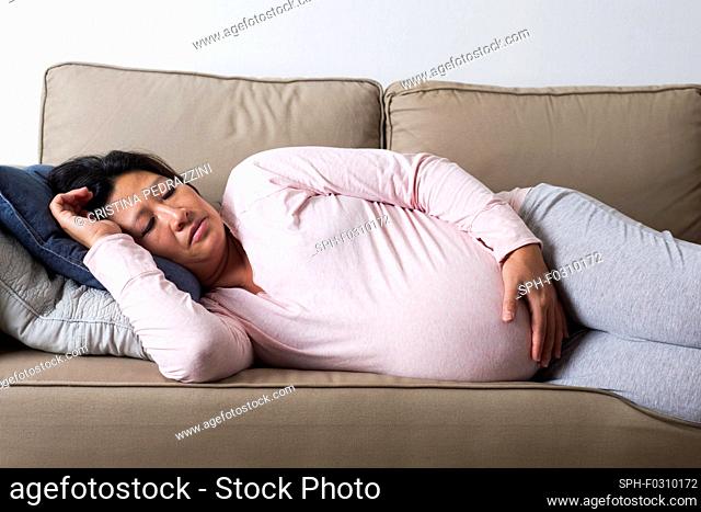 Tired pregnant woman