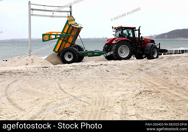 03 April 2020, Mecklenburg-Western Pomerania, Kühlungsborn: On the Baltic Sea beach behind the marina sand is transported