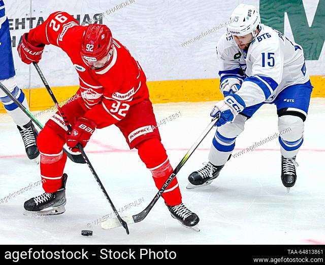 RUSSIA, MOSCOW - NOVEMBER 14, 2023: Spartak's Shane Prince (L) and Dynamo's Yegor Petukhov are in action in a 2023/24 KHL Regular Season ice hockey match...