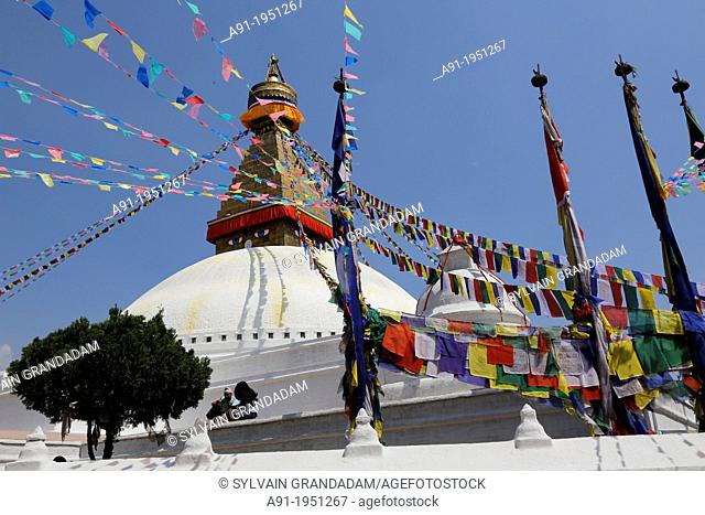 Nepal, City of Katmandu, buddhist Boudnath tibetan temple, the big stuipa and prayers flags
