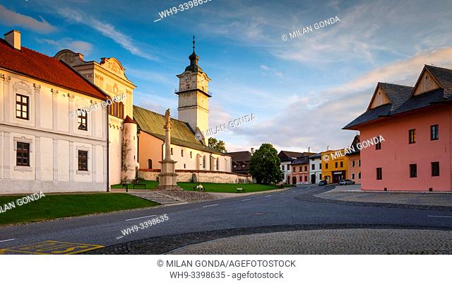 Spisska Sobota, Slovakia - June 24, 2019: Gothic church and Renaissance bell tower in the main square of Spisska Sobota in Poprad, Slovakia