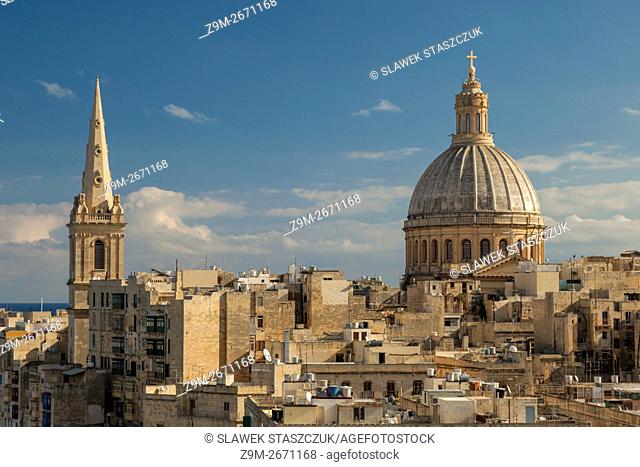 Iconic dome of the Carmelite church dominates the historic skyline of Valletta, Malta
