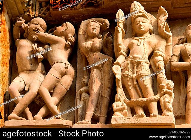 Carving of many moods on stone wall at Kandariya Mahadev Temple, under Western Group of Temples in Khajuraho, Madhya Pradesh, India, Asia