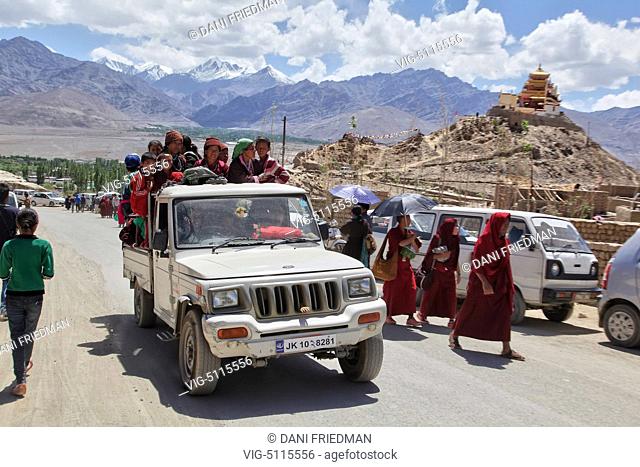 Ladakhi Buddhist pilgrims travel in an overloaded vehicle in the city of Leh after listening to His Holiness the 14th Dalai Lama perform prayers during the 33rd...