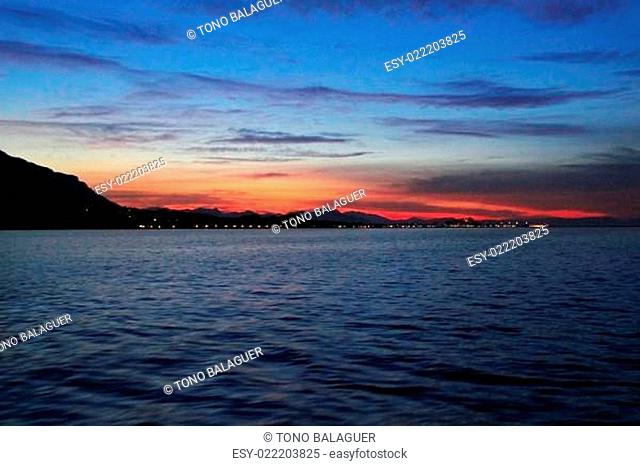 Denia sunset view from sea Mediterranean backlight