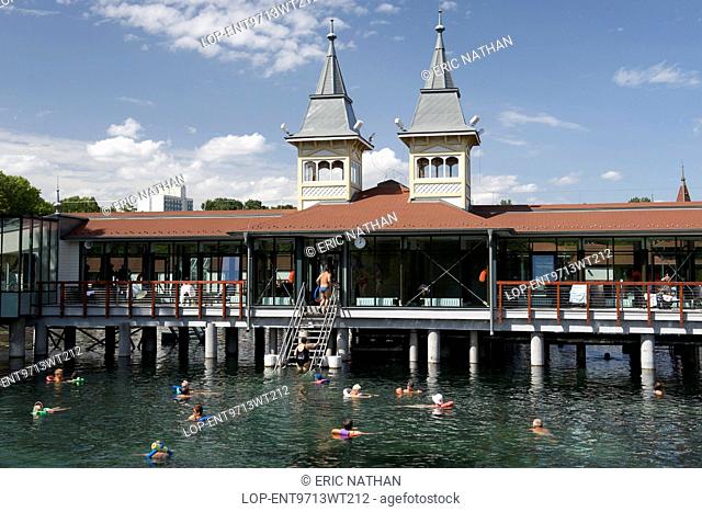 Hungary, Zala, Heviz. People swimming in the rejuvenating waters of Lake Heviz