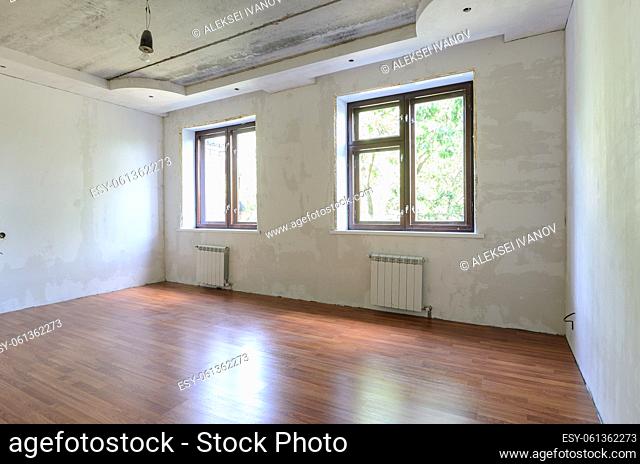 Empty room interior, wall view with windows