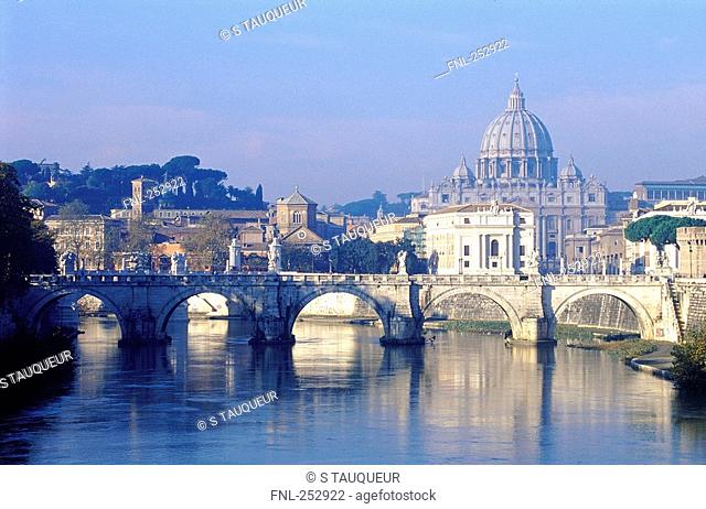Arch bridge across river, Rome, Italy