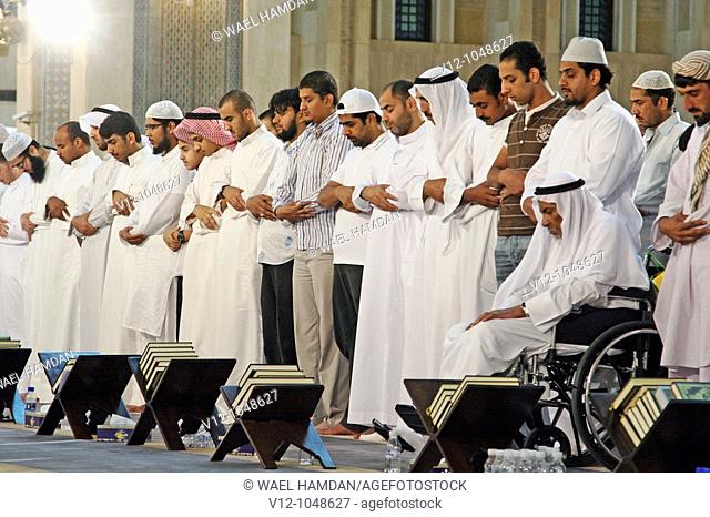 People prays at Grand Mosque of Kuwait at night prayer of Ramadan , Kuwait city, Kuwait