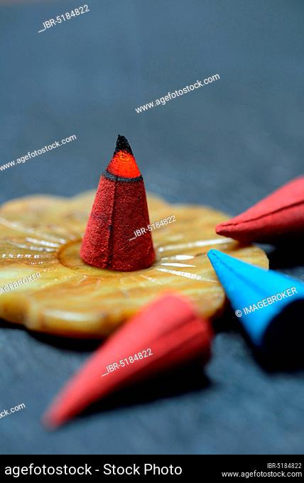 Burning incense cone, various incense cones, incense candle
