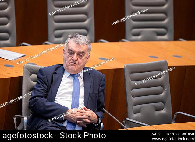 04 November 2021, North Rhine-Westphalia, Duesseldorf: Herbert Reul (CDU), Minister of the Interior, sits in the plenary session of the state parliament