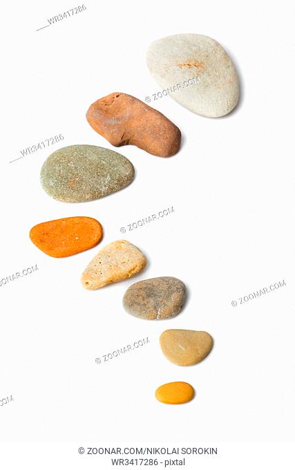 Abstract shape made of stones isolated on white background