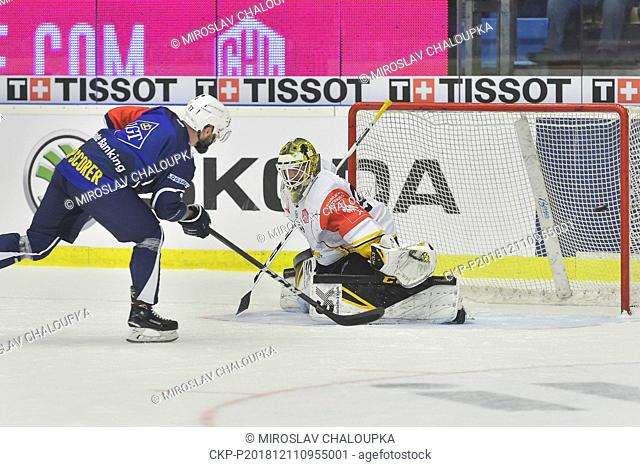 L-R Milan Gulas (Plzen) scores against goalkeeper Gustaf Lindvall (Skelleftea) in the ice hockey Champions League playoff quarterfinal second leg game HC Skoda...
