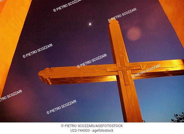 Bologna Italy, cross along the portico of the sanctuary of the Madonna di San Luca