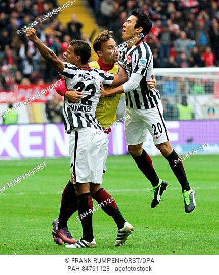 Frankfurt's Timothy Chandler (l), substitute player Haris Seferovic (M) and Makoto Hasebe (r) cheer after the 2:2 equaliser assisted by Chandler during the...