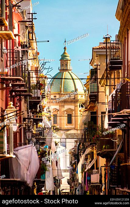 View at the church of San Matteo located in heart of Palermo, Italy, Europe; tarditional Italian medieval city center with typical narrow residential street