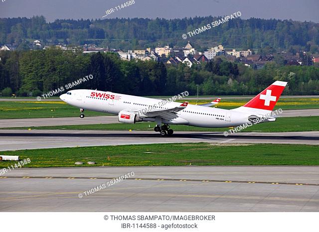 Airplane take-off from Zurich Airport, Switzerland, Europe