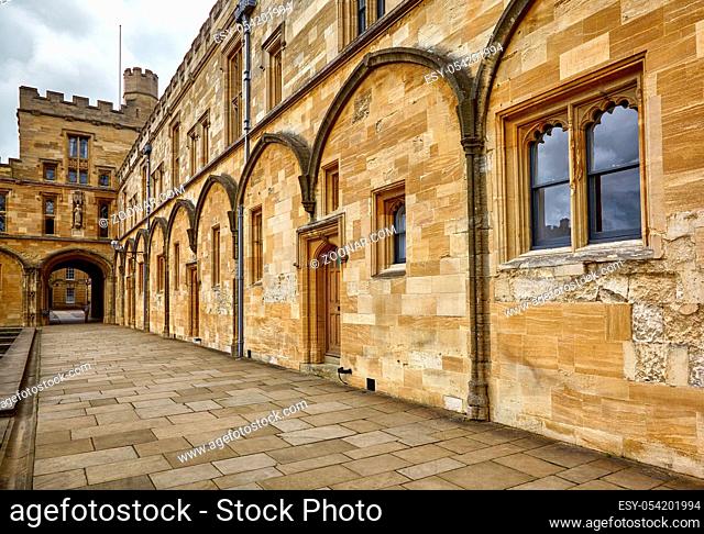 The view along the wall of Tom Quad with the Bodley Tower. Christ Church. Oxford University. England