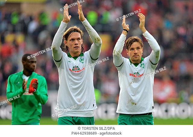 Bremen's Jannik Vestergaard and Bremen's Clemens Fritz (r) thank fans after the game of the German Bundesliga match between 1. FSV Mainz 05 vs