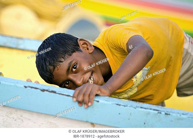 Fisher boy, boat, beach, Bekal, North Kerala, India, Asia