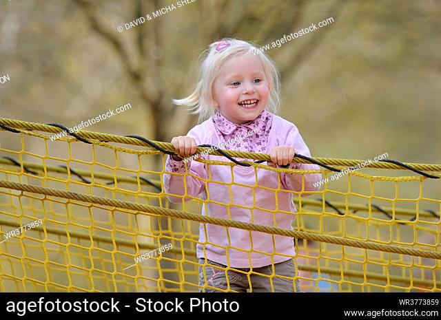 Happy girl on the playground